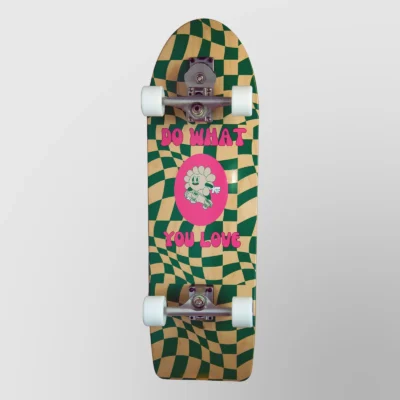 Dry Waves Do What You Love Surfskate deck with a green checkerboard and pink flower graphic